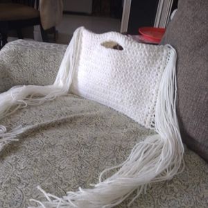 White handmade crochet bag with fringe